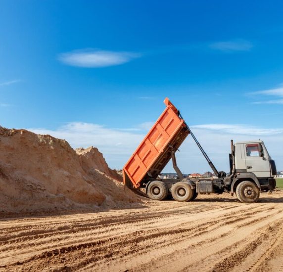 delivery-sand-construction-site-by-truck-with-raised-body_867041-615