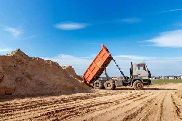 delivery-sand-construction-site-by-truck-with-raised-body_867041-615